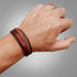 Uniqal Lederarmband braun geflochten gravierbar Schmuck Geschenk Männer Damen Unisex elegant